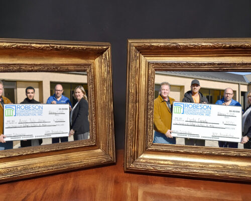 Framed photos of students receiving checks. Dustin Canady, Anas Taha Alslmi receive $250 scholarship each through RCC Fundraiser